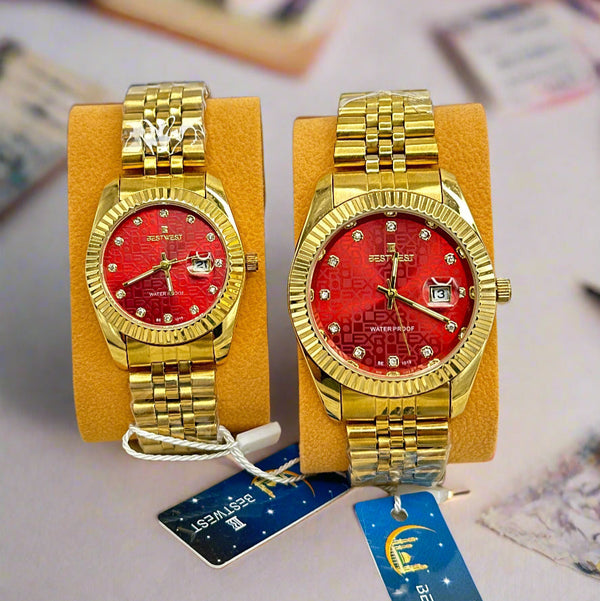 Gold watch with red face on a yellow stand, with a BestWest brand tag in the background.